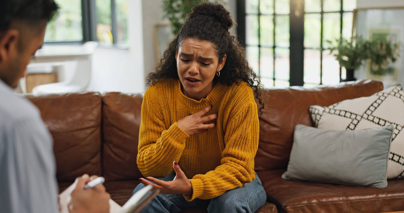 mental health counselor and patient talking about anxiety